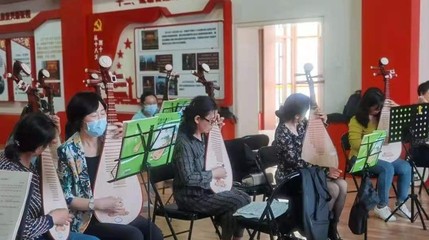 一揉玉弦万般情，弹支红曲给党听 文化艺术交流的深情颂歌